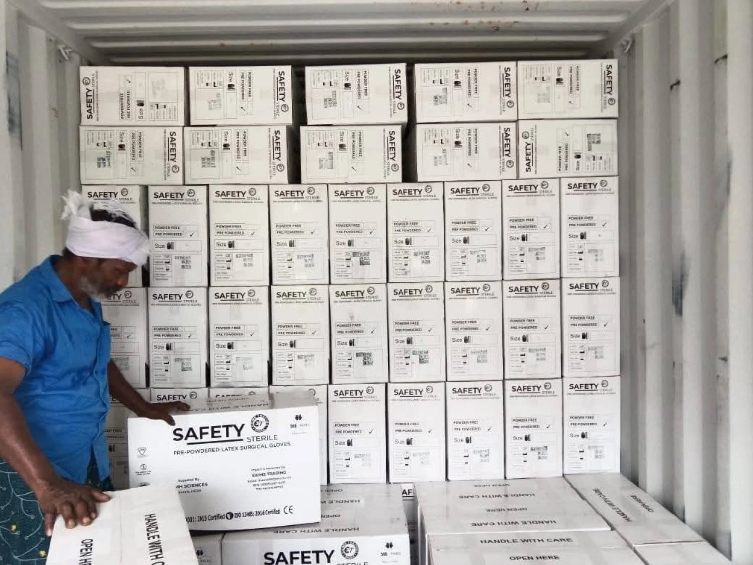 Actual Safety surgical glove carton stock in container